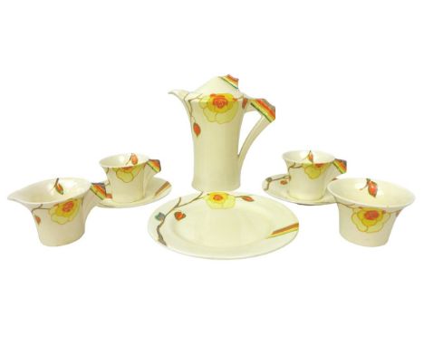 A Clarice Cliff Daffodil part coffee serice, pattern number '2209', in 'Yellow Rose' decoration, comprising a coffee pot, 18c