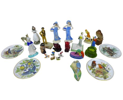 A group of ceramic figurines, including two Royal Doulton Flambe animals, modelled as a cat and fox, a/f, a Royal Doulton Win