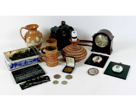 A group of mixed collectables, including a small mantel clock, WWII Kershaw binoculars, a Doulton stoneware jug 'Bread at Ple