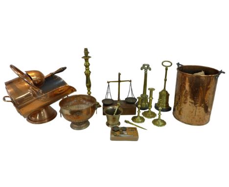 A collection of metal wares, including a copper coal scuttle and log box, a Victorian brass door stop, with long handle and l