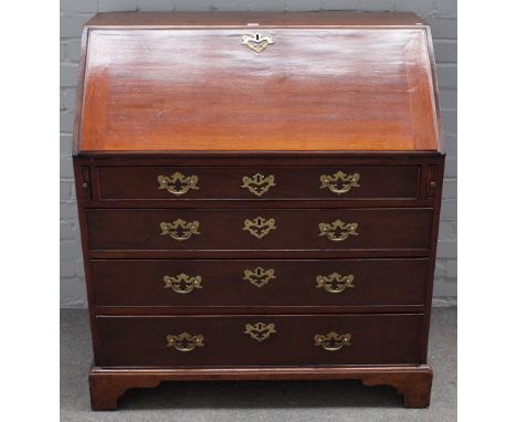A George III mahogany bureau, the fitted interior over four long graduated drawers on bracket feet, 97cm wide x 107cm high. 