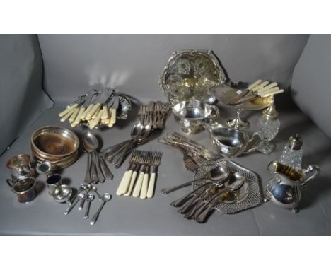 Silver plated wares, comprising; flatware, a salver, dishes, a sauceboat, bottles coasters and sundry, (qty).