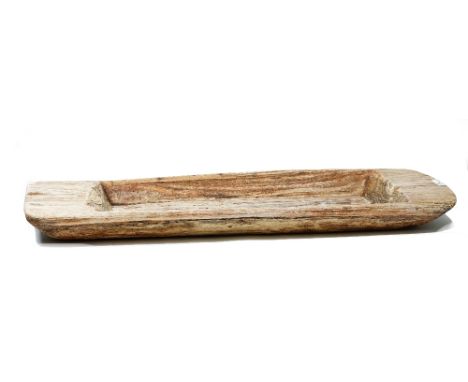 A rectangular hardwood dug out dough trough, 120cm wide x 12cm high.
