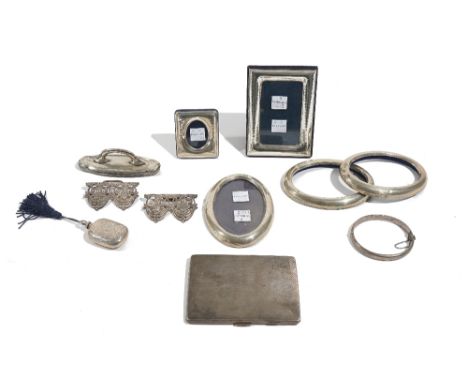 Silver and foreign wares, comprising; a rectangular cigarette case, with engine turned decoration, a two piece waistbelt buck