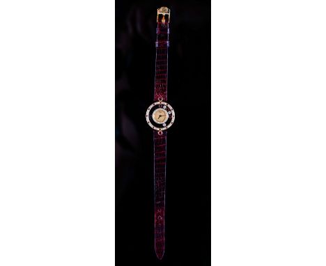 A Chopard, Geneve gold, diamond and ruby set Happy Diamonds lady's dress wristwatch, with a signed gilt dial, having a surrou