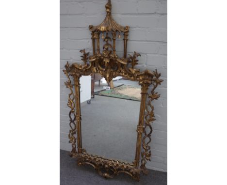 A 19th century Chinese Chippendale revival gilt framed mirror, with pagoda crest over pierced frame and opposing 'C' scroll l
