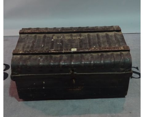 An early 20th century black painted metal travelling trunk, 74cm wide x 36cm high. 