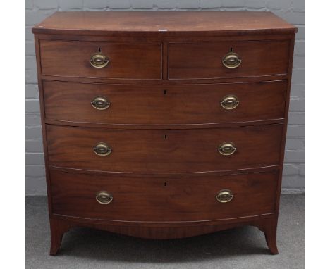 A Regency mahogany bowfront chest, of four long graduated drawers on splayed bracket feet, 105cm wide x 106cm high. 