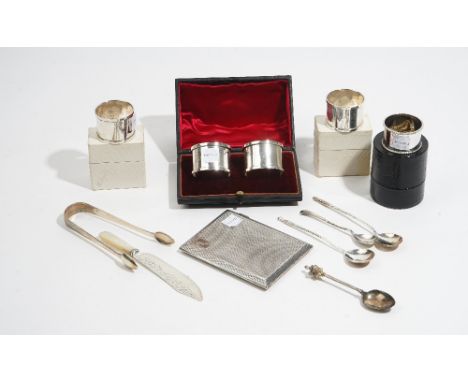 Silver and silver mounted wares, comprising: a rectangular cigarette case, a pair of napkin rings, Chester 1918, cased, a pai