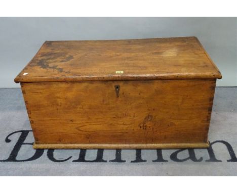 A 19th century elm lift top trunk, 85cm wide x 40cm high. 