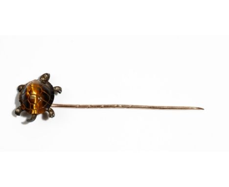 A late Victorian gold and silver set tiger's eye and diamond stick pin, designed as a tortoise, the shell formed from carved 