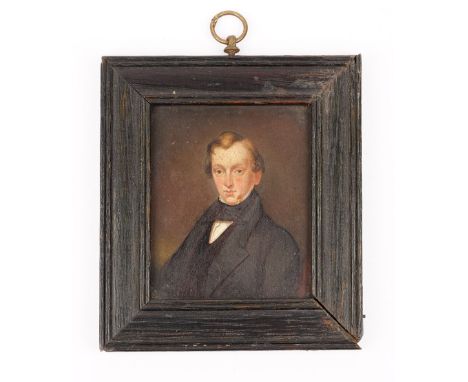 An early 19th portrait miniature depicting a gentleman painted on metal within an ebonised frame, unsigned, 8cm x 7cm.