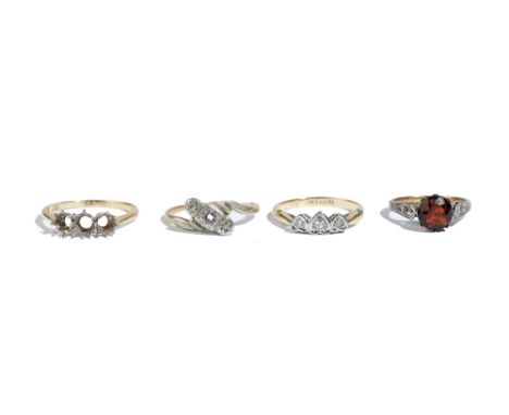 A gold and platinum, diamond set three stone ring, mounted with circular cut diamonds within heart shaped settings, detailed 