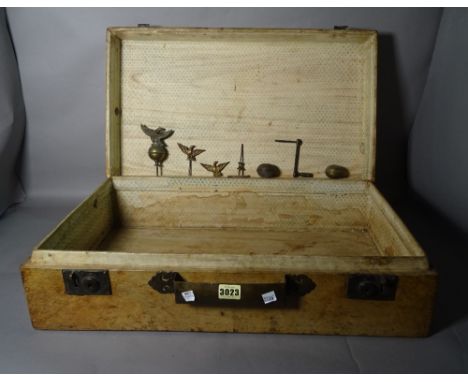 An early 20th century Chinese leather bound trunk, 70cm wide x 33cm high, and another smaller, 62cm wide x 19cm high, (2).