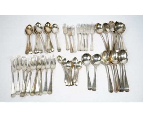 A silver Old English pattern canteen of table flatware, comprising; twelve soup spoons, twelve dessert spoons, twelve dessert