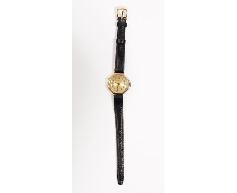 Rolex; a 9ct gold cased wristwatch, the gilt silvered dial with Arabic numbers to a 15 jewel manual wind movement, case numbe