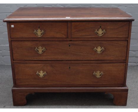 A mid-18th century oak chest, of two short and two long graduated drawers on bracket feet, 99cm wide x 77cm high. 
