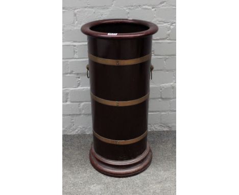 J A Wylie &amp; Co, 62 Holborn Viaduct, London EC; a brass bound cooper made mahogany stick stand, 30cm diameter x 63cm high.