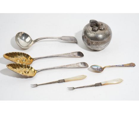 A pair of silver and gilt berry spoons, London  probably 1809, a fiddle pattern sauce ladle, London 1931, combined weight 194