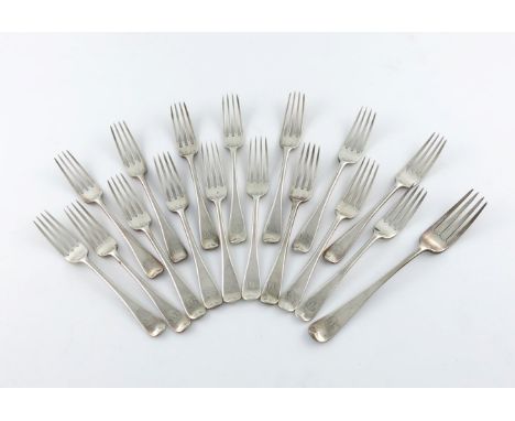 A set of sixteen Edwardian Old English pattern dessert forks, by Brook and Son (Edinburgh), London 1901/2, the terminals with