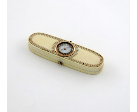 λ A George III ivory toothpick box, circa 1800, oblong form, the hinged cover with a counter marker under glass, the dial num