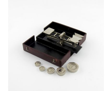 A set of late-Victorian plated postal scales, by S. Mordan and Co, London, retailed by A. Dear, Hyde Park Corner, the slide-o