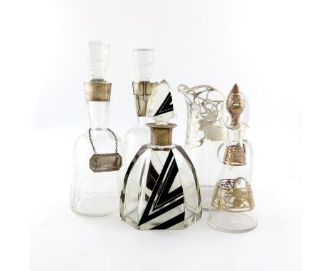 A mixed lot of silver-mounted glass wares, comprising: a continental silver-mounted Art Deco decanter, with black geometric d