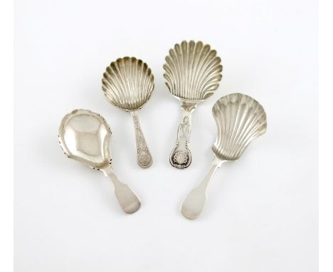 A collection of four Scottish antique silver caddy spoons, comprising one by James Wright, Edinburgh 1863, King's pattern lar