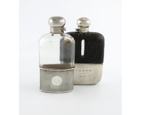 A silver-mounted glass hip flask, by James Dixon and Sons, Sheffield 1918, rounded rectangular form, pull-off drinking cup, i