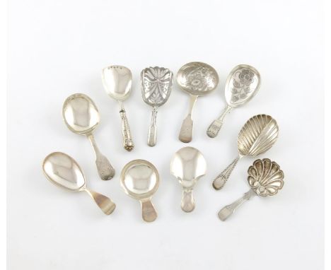 A collection of ten antique silver caddy spoons, various designs, comprising: a George IV one, by Joseph Taylor, Birmingham 1