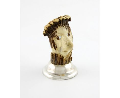 A Victorian novelty silver-mounted table vesta holder and striker, by S. Mordan, London 1879, carved as the head of Ally Slop