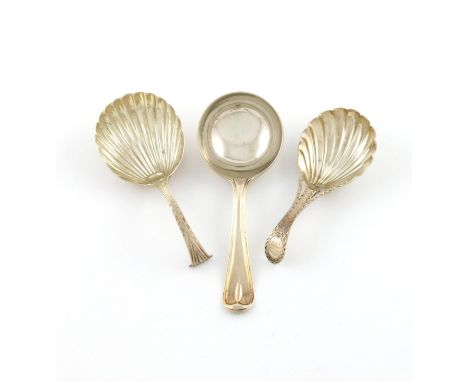 A small collection of three George III silver caddy spoons, comprising: one of Old English Thread and Drop pattern, by George