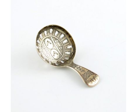 A George III silver caddy spoon, by Joseph Taylor, Birmingham 1811, the circular bowl with a pierced border and with engraved