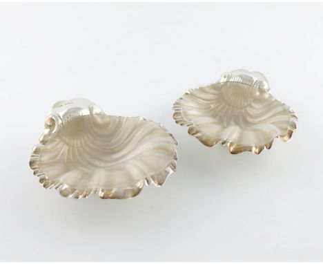 A pair of late-Victorian silver butter shells, by Thomas Bradbury and Sons, Sheffield 1898, shell form, with frosted glass li