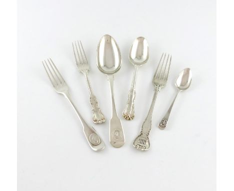 A mixed lot of silver Private Die flatware, comprising: a William IV table fork, the terminal with The Mansion House, by Will