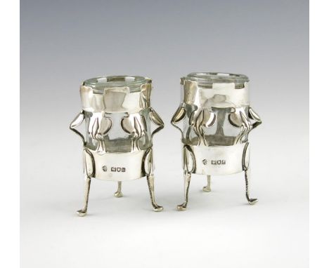 By William Hutton and Sons, a pair of Edwardian Art Nouveau silver vases, London 1903, circular form, the bodies with a pierc