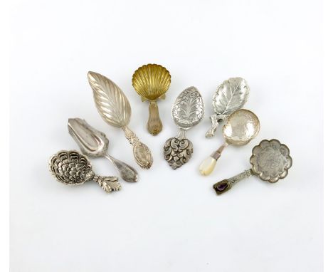 A collection of eight continental silver caddy spoons, comprising two Italian ones by Buccellati, of leaf form, a Dutch one, 