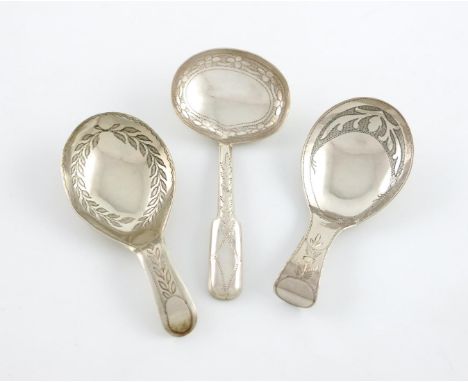 A George III silver caddy spoon, by Samuel Pemberton, Birmingham 1809, the oval bowl with a border of engraved leaf decoratio