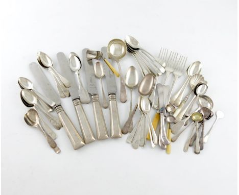 λ A mixed lot of silver flatware, comprising: four table knives, a sauce ladle, London 1782, an Exeter cream ladle, three des