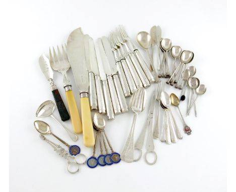 λ A mixed lot of silver flatware, various dates and makers, comprising: an Arts and Crafts spoon, by George Hart for the Guil