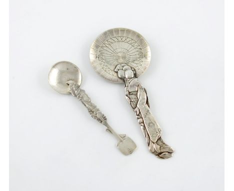 A Japanese silver caddy spoon, modelled as a standing Geisha lady, holding a parasol, length 13.8cm, plus another smaller Jap