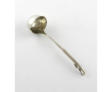 By Georg Jensen, a Danish silver sauce ladle, design no. 85, circa 1915-27, deep oval bowl, the handle with fluted, scroll an