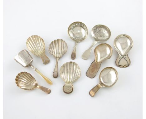 A collection of ten antique silver caddy spoons, various designs, comprising: one London 1796, the circular bowl with pierced