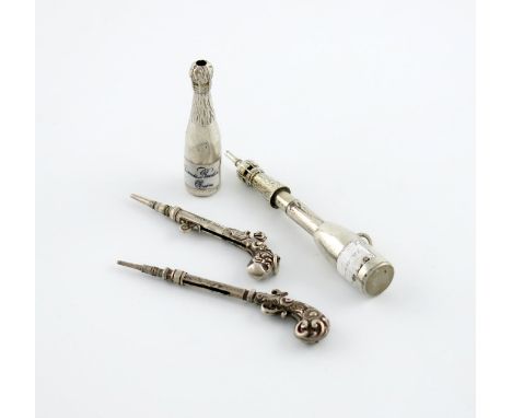A small collection of four novelty silver pencils, comprising: one by S. Mordan, of champagne bottle form, enamel label, anot