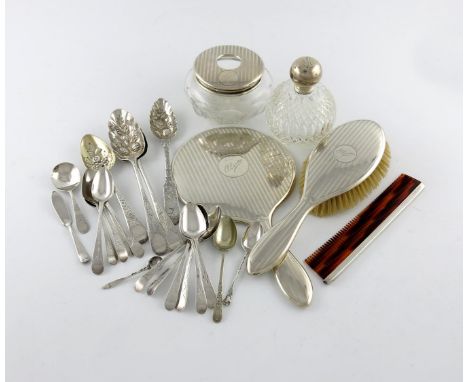 λ A mixed lot of silver items, comprising: a matched five-piece Canadian and English dressing table set, inscribed, and a pai