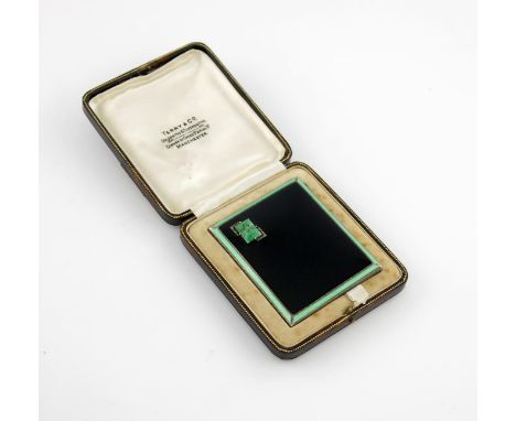 An Art Deco silver and enamel cigarette case, by The Adie Brothers, Birmingham 1935, rectangular form, the front with black e