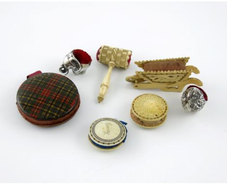 λ A small collection of pin cushions, comprising: a modern silver one modelled as a chick and one modelled as an elephant, pl