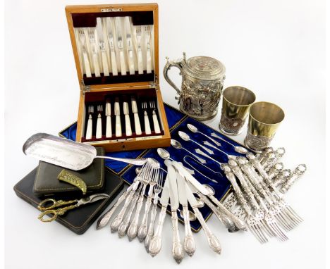 A mixed lot, comprising silver items: a set of eight fruit knives and forks, with mother-of-pearl handles, by The Goldsmiths 