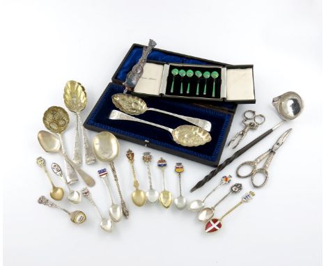 λ A mixed lot of silver flatware, various dates and makers, comprising: a cased pair of berry spoons, two further berry spoon
