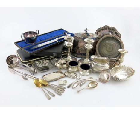 A mixed lot, comprising silver items: a cream jug, a kiddish cup, a Seal-top caddy spoon, a pair of candlesticks, two bonbon 